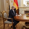 German chancellor warns of far-reaching sanctions if Russia acts on Ukraine