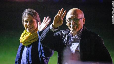 Nazanin Zaghari-Ratcliffe, left, and Anousha Ashouri, who have been released from Iran, wave after landing at RAF Brize Norton in England on March 17, 2022.