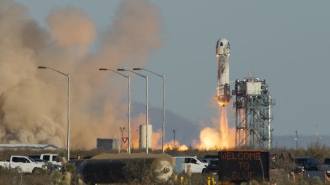 A Blue Origin New Shepard rocket launches on December 11, 2021 in West Texas near Van Horn. 