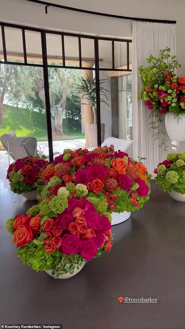 BEAUTIFUL: On her Instagram Stories, Kardashian shared videos of her scanning her sprawling mansion displaying piles of flowers from her beau