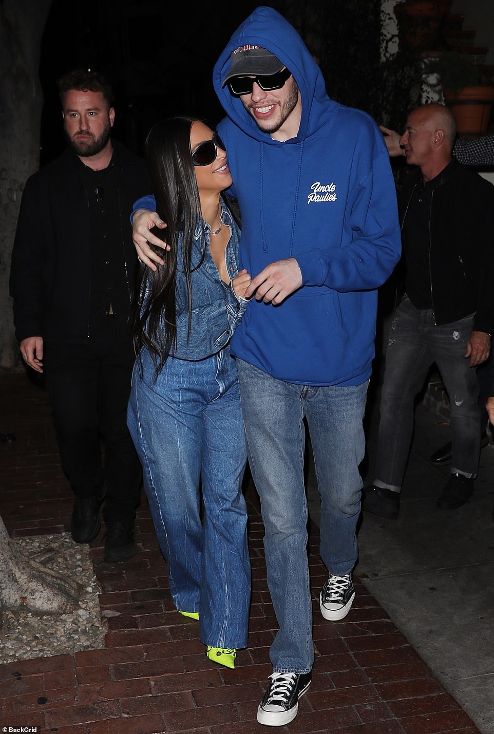 Kim Kardashian and SNL star Pete Davidson were happy Monday night as they left a double date with Amazon founder Jeff Bezos and girlfriend Lauren Sanchez