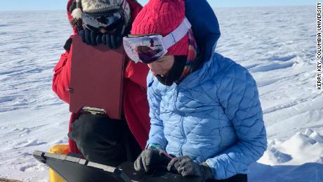 The team is checking data from a magnetic station they used to map the bottom of the ice sheet.