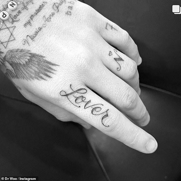 New tatts: David and Victoria Beckham's son got another tattoo in December, choosing to put ink on his index finger 