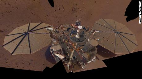     InSight's second full selfie, composed of multiple images taken in March and April of 2019, shows dust accumulating on the solar panels.