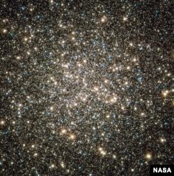 This image, captured by NASA's Hubble Space Telescope, shows M13, or the constellation Hercules, located 25,000 light-years from Earth.  Image credits: NASA, ESA, and the Hubble Heritage Team)