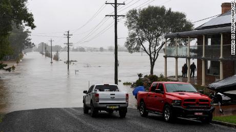Houses and roads are submerged in the swollen Hawkesbury River in Windsor, northwest Sydney, July 4, 2022.