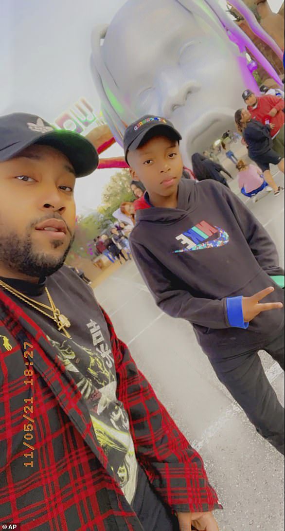 Ezra Blount (right) and his father, Triston Blount (left), photographed at Astroworld