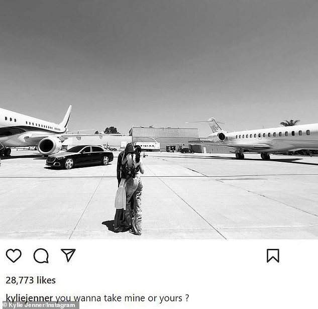 Flashy photo: It comes after fans criticized Kylie and Travis Scott for bragging about his planes and private jets as she asked followers 