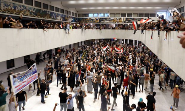 Demonstrators gathered inside the Iraqi parliament building