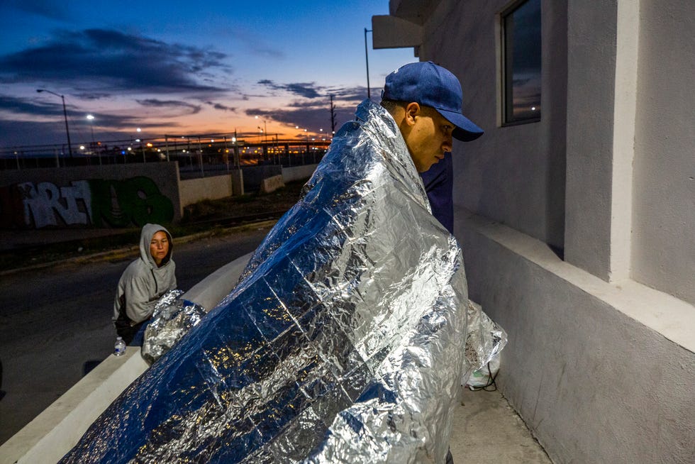 Venezuelan migrants sleep in the streets of Ciudad Juarez after being expelled from the United States on October 15, 2022. 