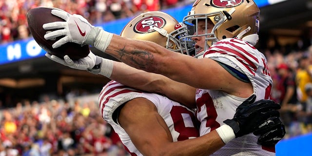 Christian McCaffrey, running back for the San Francisco 49ers, celebrates his touchdown with wide receiver Willie Snead fourth during the second half against the Los Angeles Rams, October 30, 2022, in Englewood, California.