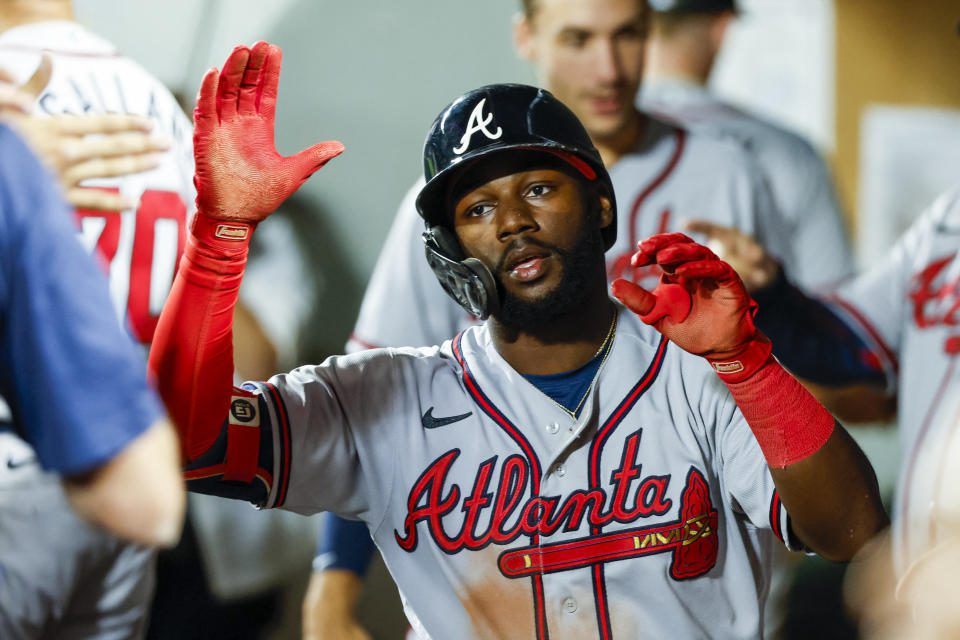 September 9, 2022;  Seattle, Washington, USA;  Atlanta Braves quarterback Michael Harris second (23) of his teammates in the dugout after hitting a solo home run against the Seattle Mariners during the sixth inning at T-Mobile Park.  Mandatory credit: Joe Nicholson-USA TODAY Sports