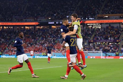 Mbappe celebrates with his teammates.