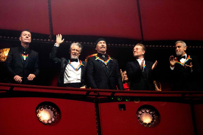 (LR) Honored U2 Irish musicians Larry Mullen Jr., Adam Clayton, The Edge, Bono and actor George Clooney attend the 45th Kennedy Center Honors Gala at the John F. Kennedy Center for the Performing Arts in Washington, D.C. on December 4, 2022.